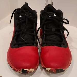 Boys UA basketball shoes